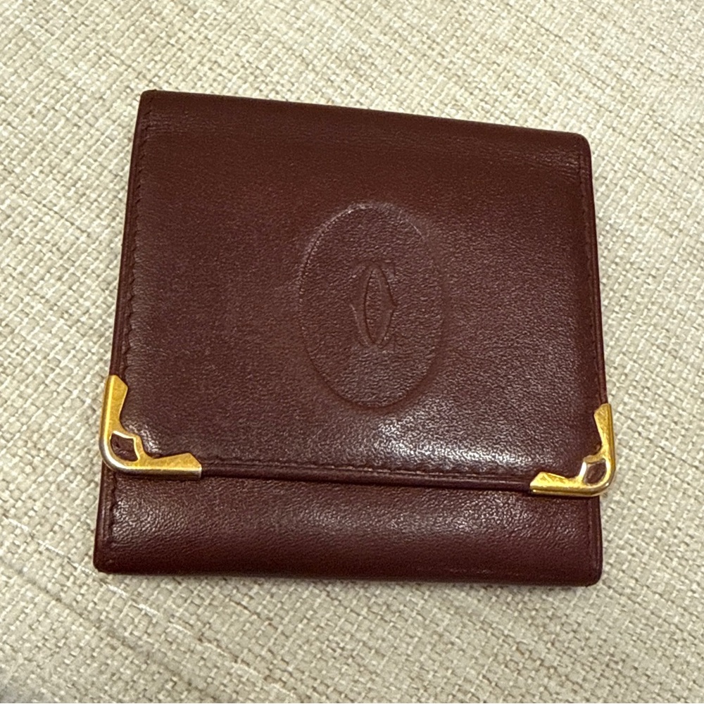 CARTIER Burgundy Leather Coin Wallet with Gold Accents
